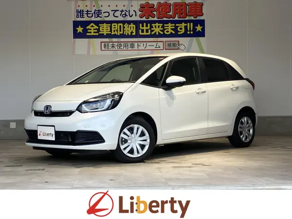 Honda Fit 1.5 e:HEV Home Grade with Genuine 7-inch Navi, Backup Camera, ETC, Collision Mitigation Braking, Adaptive Cruise Control, Electronic Parking, Auto Brake Hold, Smart Key, Auto Lights, Power Folding Mirrors, Vehicle Stability Assist, USB Charging (Platinum White Pearl)