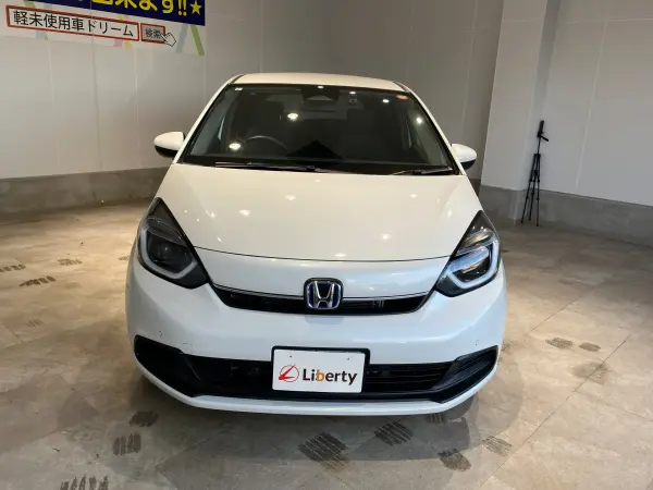 Honda Fit 1.5 e:HEV Home Grade with Genuine 7-inch Navi, Backup Camera, ETC, Collision Mitigation Braking, Adaptive Cruise Control, Electronic Parking, Auto Brake Hold, Smart Key, Auto Lights, Power Folding Mirrors, Vehicle Stability Assist, USB Charging (Platinum White Pearl) — photo 9
