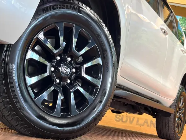 Toyota Land Cruiser Prado 2.7 TX L Package 70th Anniversary Limited 4WD Non-Smoking 7-Seater Sunroof Factory Navigation 360 Camera Radar Cruise LED Headlights Auto High Beam Brown Leather Power Seats Seat Ventilation Genuine 18-inch Alloy ETC Clearance Sonar (White Pearl Crystal Shine) — photo 9