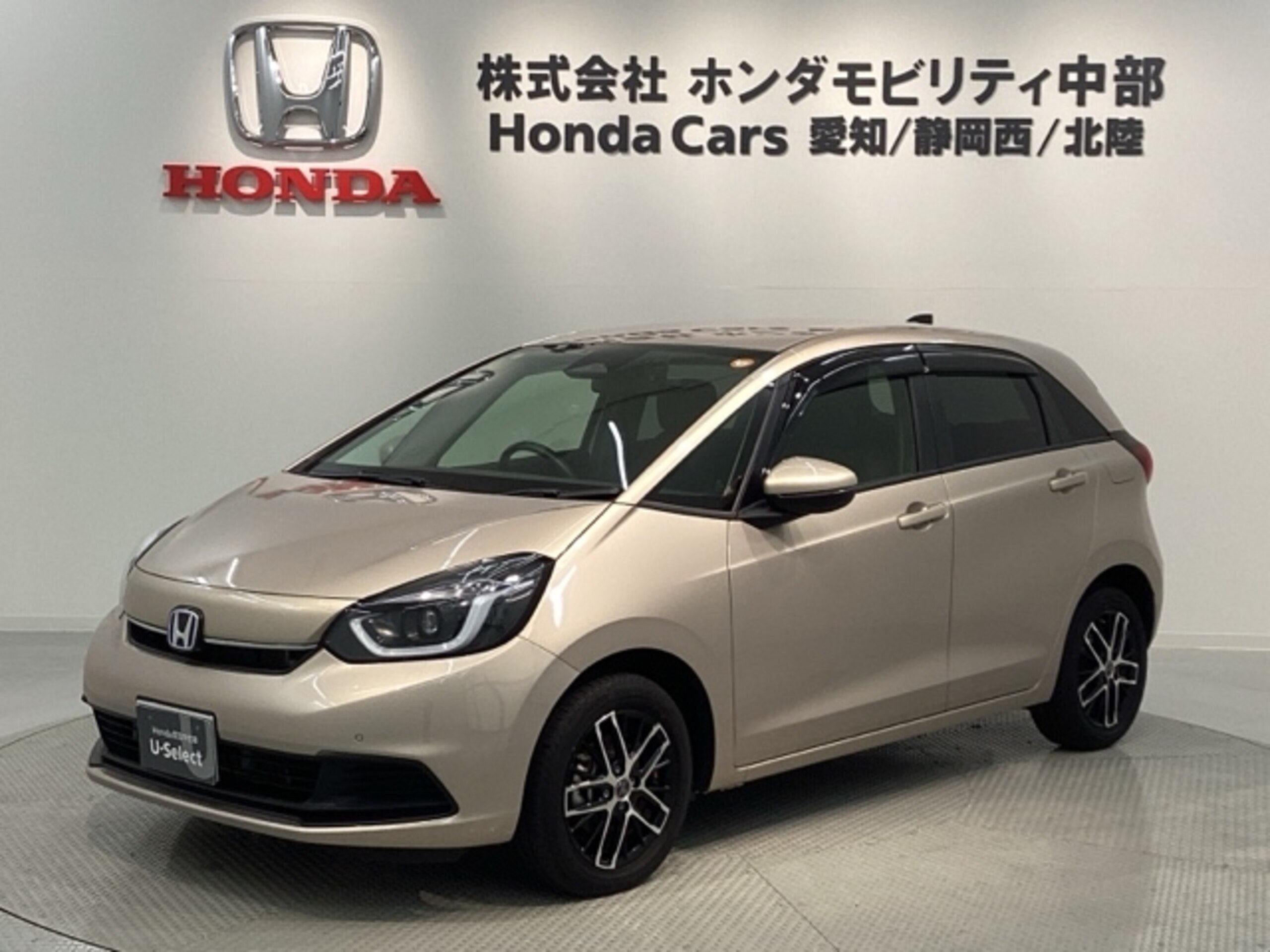 Honda Fit 1.5 e:HEV Home H SENSING 5-Year Warranty One-Owner Navigation VXU-225FTi TV Rear Camera CD Recording BT Audio DVD Drive Recorder ETC LED Lights VSA Cruise Control Alloy Wheels Smart Key (Rose Gold Metallic)