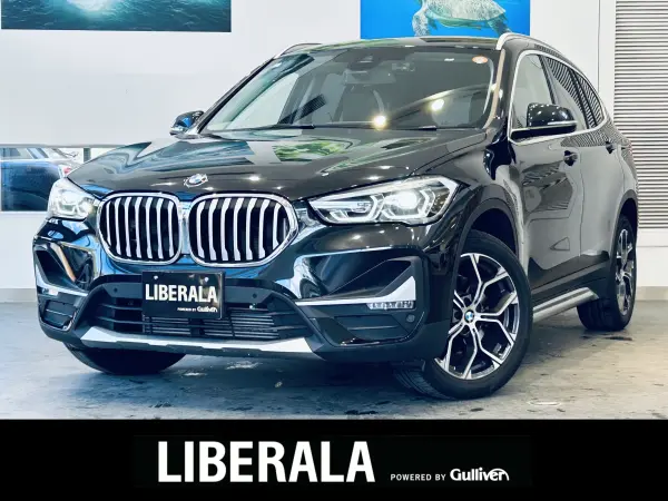 BMW X1 xDrive 18d xLine Edition Joy Plus 4WD Highline P Comfort P Intelligent Safety ACC Genuine Navigation Backup Camera Genuine 18-inch AW LED Headlights Power Tailgate Brown Leather Power Seats Driver Seat Memory Seat Heaters Wireless Charging Roof Rails (Black Sapphire Metallic) — thumbnail 1