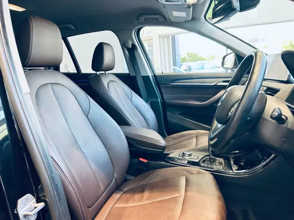 BMW X1 xDrive 18d xLine Edition Joy Plus 4WD Highline P Comfort P Intelligent Safety ACC Genuine Navigation Backup Camera Genuine 18-inch AW LED Headlights Power Tailgate Brown Leather Power Seats Driver Seat Memory Seat Heaters Wireless Charging Roof Rails (Black Sapphire Metallic) — photo 9