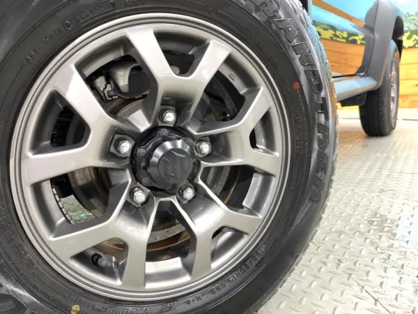 Suzuki Jimny Sierra 1.5 JC 4WD with Genuine Display Audio, Backup Camera, Full-Seg, Safety Support, Cruise Control, LED Headlights, Auto Lights, Genuine 15-inch AW, Auto Air Conditioning, Seat Heater, Smart Key, Non-Smoking (Blueish Black Pearl 3) — photo 9