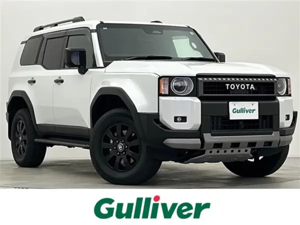 Toyota Land Cruiser 250 2.7 VX First Edition 4WD Moon Roof Modellista Package Round Headlamps Panoramic View Monitor Genuine Connect Navigation Digital Inner Mirror Power Back Door BSM Special Brown Leather Seats Safety Sense Full-Seg TV (Platinum White Pearl Mica) — thumbnail 1