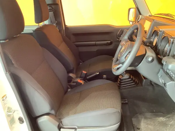 Suzuki Jimny Sierra 1.5 JC 4WD with Suzuki Safety Support, Aftermarket Display, B Camera, Cruise Control, LED Headlights, Fog Lights, Smart Key, Push Start, Idling Stop, Leather-Wrapped Steering Wheel, Front Seat Heaters, Genuine Aluminum Wheels (Pure White Pearl) — photo 7