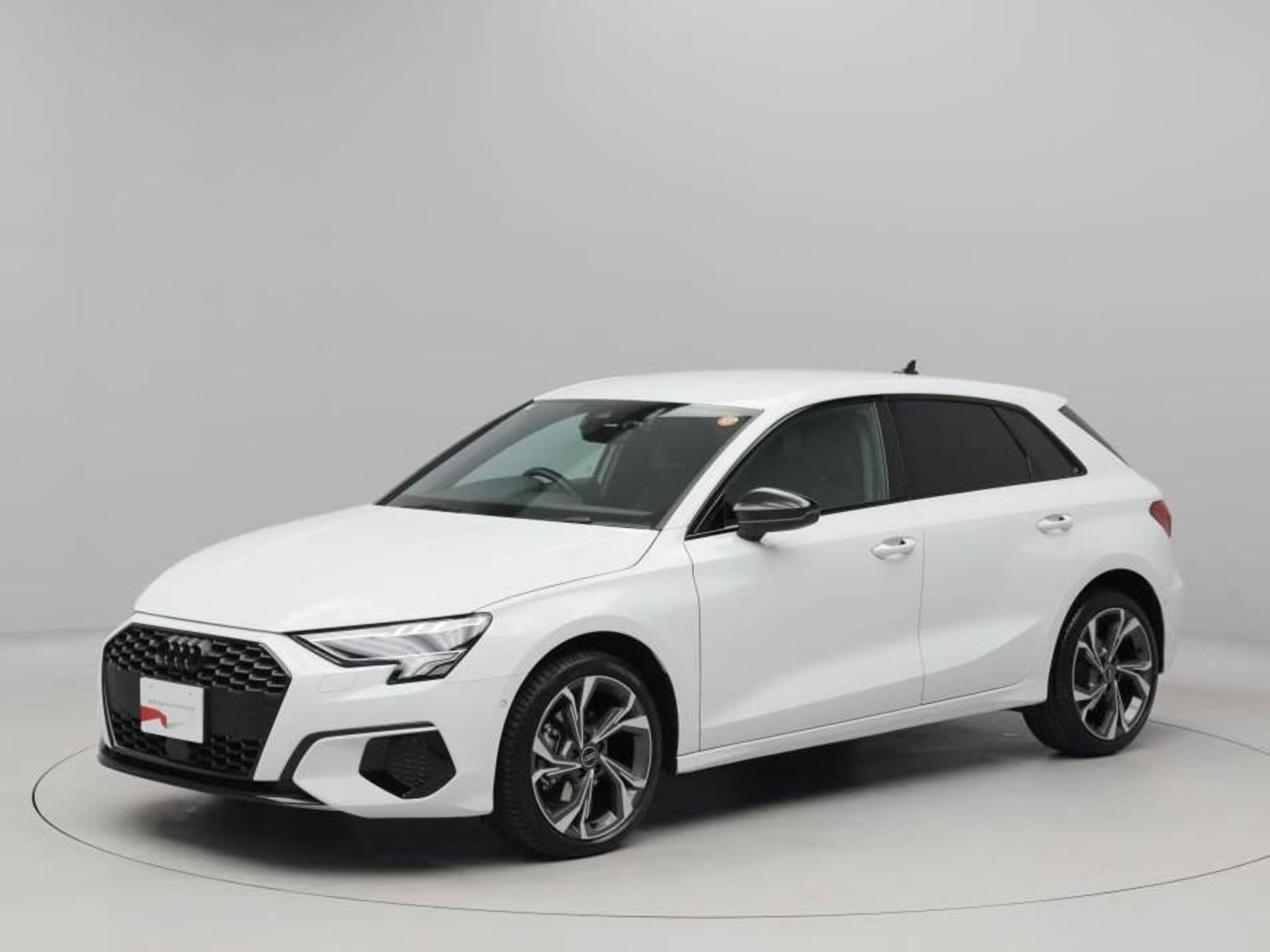 Audi A3 Sportback 30 TFSI Signature Edition Black Styling 18-inch Alloy LED Headlights Heated Power Front Seats Privacy Glass Smartphone Interface Wireless Charging Rear Camera Front/Rear Brake Assist Navigation TV (Glacier White Metallic)
