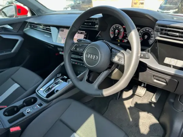 Audi A3 Sportback 30 TFSI Advanced LED Headlights 17-inch Alloy Wheels Front Power Seats (with Heater) Dual-Zone Climate Control Rear Camera Front and Rear Brake Assist Radar Cruise Control Side Assist Lane Keep Assist Virtual Cockpit Genuine Navigation TV (Progressive Red Metallic) — photo 7