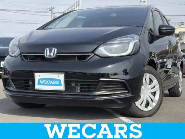 Honda Fit 1.5 e:HEV Home Grade with Genuine 9-inch Memory Navi, Honda Sensing, Lane Departure Prevention, Half Leather Seats, LED Headlamps, Bluetooth, ETC, ABS with EBD, Vehicle Stability Assist (Crystal Black Pearl) — thumbnail 1