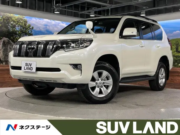 Toyota Land Cruiser Prado 2.7 TX 4WD Moonroof 7-Seater 9-inch SD Navigation Clearance Sonar Cold Spec Backup Camera LED Headlights Radar Cruise Paddle Shift Auto Lights Black Roof Rails (White Pearl Crystal Shine) — thumbnail 1
