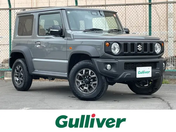 Suzuki Jimny Sierra 1.5 JC 4WD with Aftermarket 8-inch Memory Navigation, Bluetooth, Full-Seg TV, Backup Camera, ETC, LED Headlights, Auto Headlights, Collision Damage Mitigation Braking, Lane Assist, Smart Key, Cruise Control (Medium Gray)