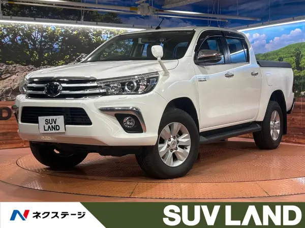 Toyota Hilux 2.4 Z Diesel Turbo 4WD Non-Smoking Car / Genuine SD Navigation / Backup Camera / Collision Mitigation System / Radar Cruise Control / Dashcam / Smart Key / LED Headlights / Genuine 17-inch Alloy Wheels / Lane Departure Warning / Auto Lights / Bluetooth (Super White II) — thumbnail 1