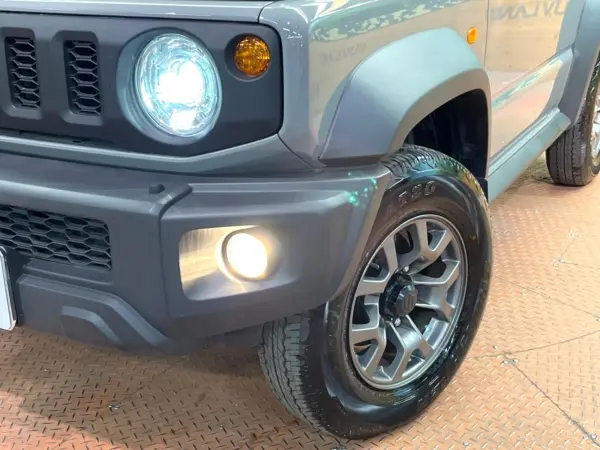 Suzuki Jimny Sierra 1.5 JC 4WD with Factory 8-inch Navigation, Full-Seg TV, Backup Camera, Safety Support, Cruise Control, Corner Sensors, Downhill Assist, LED Headlights, Seat Heaters, ETC, Factory 15-inch Alloy Wheels, Idling Stop (Medium Gray) — photo 8