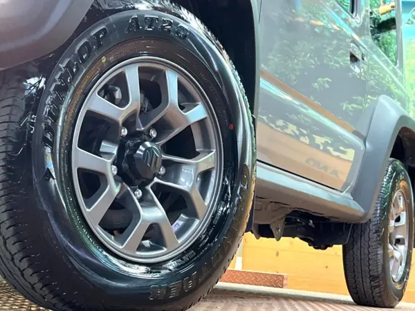 Suzuki Jimny Sierra 1.5 JC 4WD with Factory 8-inch Navigation, Full-Seg TV, Backup Camera, Safety Support, Cruise Control, Corner Sensors, Downhill Assist, LED Headlights, Seat Heaters, ETC, Factory 15-inch Alloy Wheels, Idling Stop (Medium Gray) — photo 9