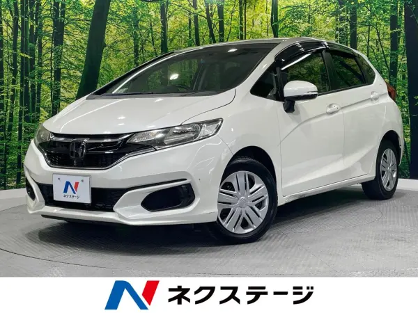 Honda Fit 1.3 13G F Honda Sensing Genuine Navigation Non-Smoking Vehicle Back Camera Built-in ETC Adaptive Cruise Control Auto Air Conditioning Bluetooth Compatible Terrestrial Digital TV Lane Departure Warning Idling Stop (Premium White Pearl II)