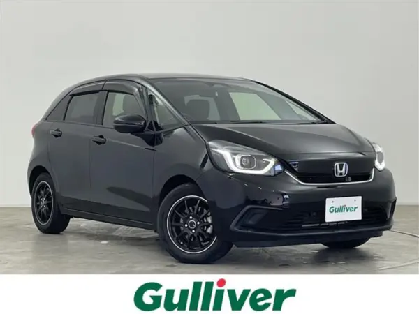 Honda Fit 1.5 e:HEV Home Grade with Factory 9-inch Navi, Honda Sensing, Adaptive Cruise Control, Front/Rear Factory Drive Recorder, Lane Keep Assist, Built-in ETC, Pre-Collision Safety, Anti-Skid, Backup Camera, Non-Smoking (Crystal Black Pearl)