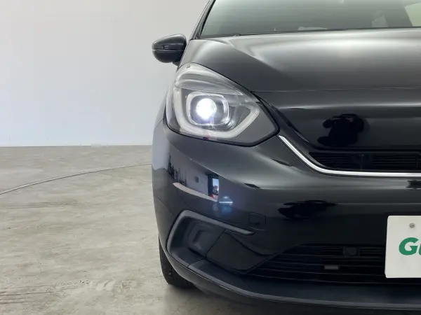 Honda Fit 1.5 e:HEV Home Grade with Factory 9-inch Navi, Honda Sensing, Adaptive Cruise Control, Front/Rear Factory Drive Recorder, Lane Keep Assist, Built-in ETC, Pre-Collision Safety, Anti-Skid, Backup Camera, Non-Smoking (Crystal Black Pearl) — photo 8