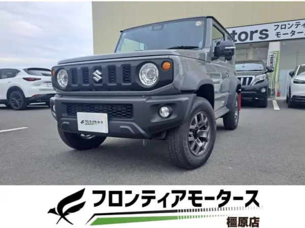 Suzuki Jimny Sierra 1.5 JC 4WD with Navigation, Full-Seg, Backup Camera, Seat Heater, Obstacle Sensor, Front/Rear Dashcam, Alpine Digital Inner Mirror, Alpine Speakers, Lane Assist, Anti-Theft System, Collision Damage Mitigation System, ETC (Medium Gray) — thumbnail 1