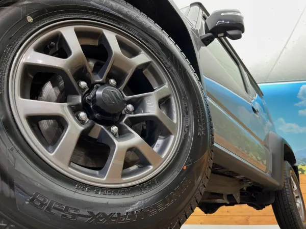 Suzuki Jimny Sierra 1.5 JC 4WD with SD Navigation, Backup Camera, Collision Damage Mitigation System, Cruise Control, Non-Smoking Car, Smart Key, LED Headlights, ETC, Genuine 15-inch Alloy Wheels, Lane Departure Warning, Auto Lights, Dual Air Conditioning (Medium Gray) — photo 9