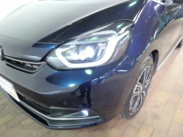 Honda Fit 1.5 LUXE HondaSENSING Special with Navigation, Non-Smoking, Genuine 9-inch SD Navi, Full-Seg, DVD, Bluetooth, Rear Camera, ETC, LED, Adaptive Cruise Control, Electronically Controlled Parking Brake, Leather-Wrapped Steering Wheel, Steering & Seat Heater, LUXE Exclusive Exterior & 16AW (Midnight Blue Beam Metallic) — photo 8