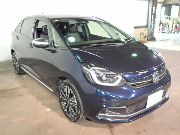 Honda Fit 1.5 LUXE HondaSENSING Special with Navigation, Non-Smoking, Genuine 9-inch SD Navi, Full-Seg, DVD, Bluetooth, Rear Camera, ETC, LED, Adaptive Cruise Control, Electronically Controlled Parking Brake, Leather-Wrapped Steering Wheel, Steering & Seat Heater, LUXE Exclusive Exterior & 16AW (Midnight Blue Beam Metallic) — photo 9