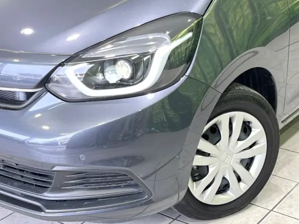 Honda Fit 1.5 e:HEV Home Non-Smoking Car Genuine 9-inch Navi Backup Camera Honda Sensing Corner Sensors Auto Light LED Headlights ETC Electric Parking Brake Lane Departure Warning Half Leather Seats Auto Air Conditioning Smart Key (Meteoroid Gray Metallic) — photo 8