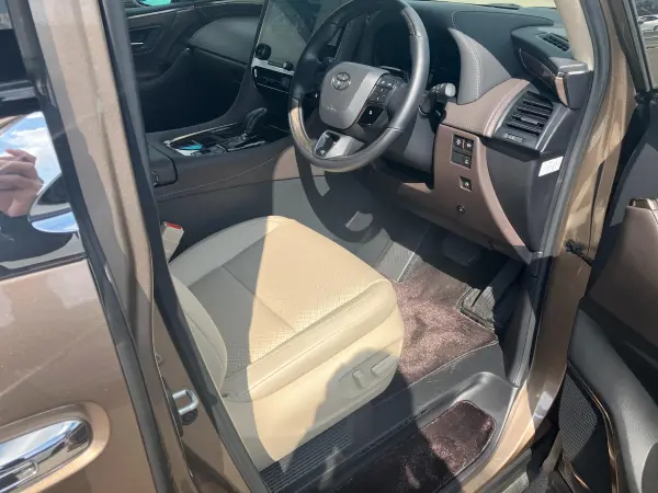 Toyota Alphard Hybrid 2.5 Executive Lounge E-Four 4WD Right-Hand Drive / Precious Leoblond / One Owner / Signature Illuminated Blade / Toyota Team Mate / Dual Moonroof / Universal Step / 360° Camera / ETC 2.0 / Front & Rear Drive Recorder / JBL Sound / Genuine Navigation / TV (Precious Leoblond) — photo 9