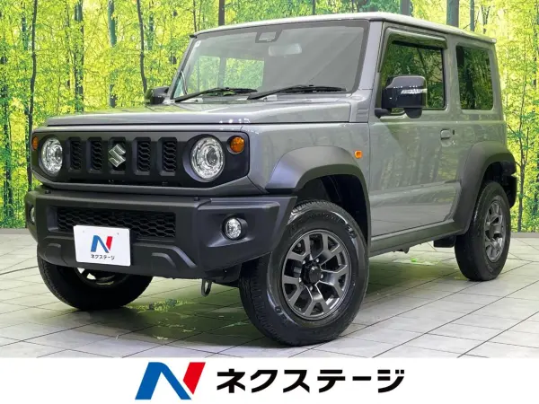 Suzuki Jimny Sierra 1.5 JC 4WD with Back Camera, Suzuki Safety Support, Non-Smoking, Seat Heater, Corner Sensor, Smart Key, LED Headlights, 9-inch Display Audio, Cruise Control, Genuine 15-inch Alloy Wheels, Lane Departure Warning (Medium Gray) — thumbnail 1