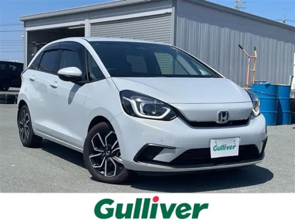 Honda Fit 1.5 e:HEV Home Grade with Genuine Navi, Backup Camera, ETC, BT (Premium Sunlight White Pearl) — thumbnail 1