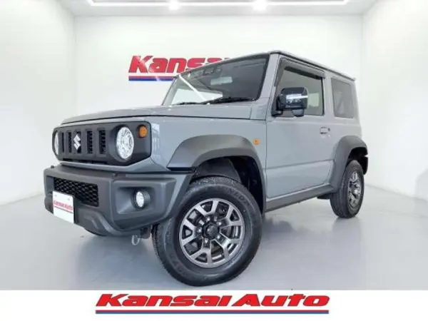 Suzuki Jimny Sierra 1.5 JC 4WD Type 4 / Genuine 8-inch Navigation / Backup Camera / ETC / Navigation-linked Front and Rear Dashcam / Bluetooth / TV / USB / Rear Parking Sensor / LED Headlights / Seat Heater / Genuine Door Visor / Cruise Control (Medium Gray) — thumbnail 1