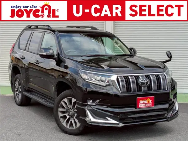 Toyota Land Cruiser Prado 2.7 TX L Package 4WD Modellista Aero Kit Sunroof 8-inch Navigation + Backup Camera Power Seat Seat Heater + Seat Cooler 3rd Row Power Folding Bluetooth ETC ACC LED Headlights Fog Lights Roof Rails White Leather Seats (Black)