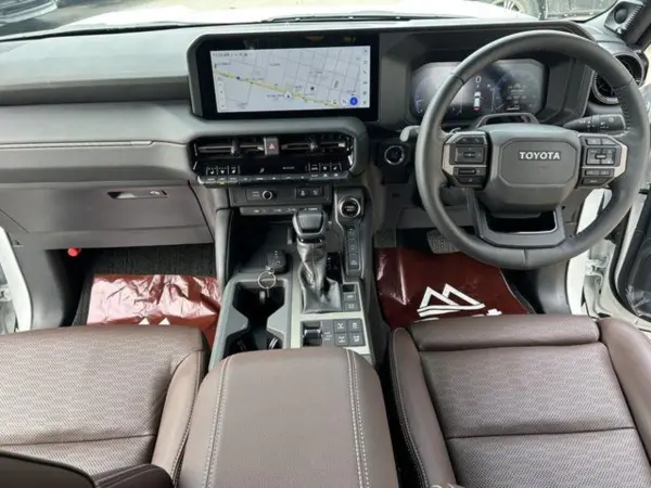 Toyota Land Cruiser 250 2.8 ZX First Edition Diesel Turbo 4WD JBL Sound System Around View Monitor Full-Seg TV Sunroof Round Headlights Wireless Charging Toyota Teammate Leather Seats All-Seat Heater & Cooler Front Power Seats 3rd Row Power Folding Seats (Platinum White Pearl Mica) — photo 7