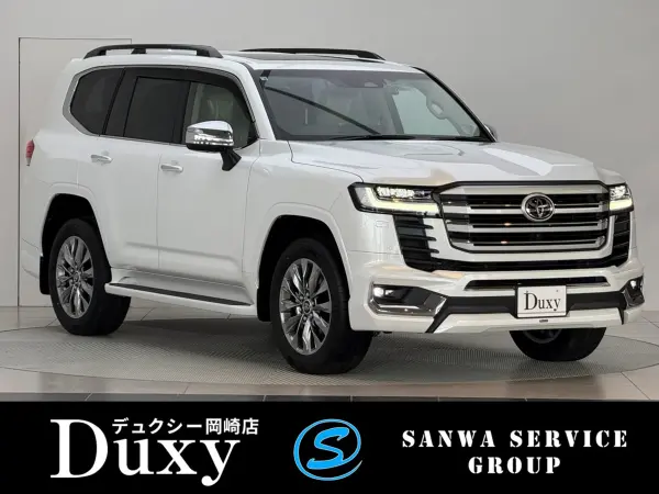 Toyota Land Cruiser 300 3.5 ZX 4WD Annual Model Change Modellista Aero Kit Rear Electric Diff Lock Cool Box Tire Pressure Sensor ITS Connect Cold Region 12.3-inch JBL Premium Sound Navigation Rear Entertainment System Interior Beige Leather (Precious White Pearl) — thumbnail 1