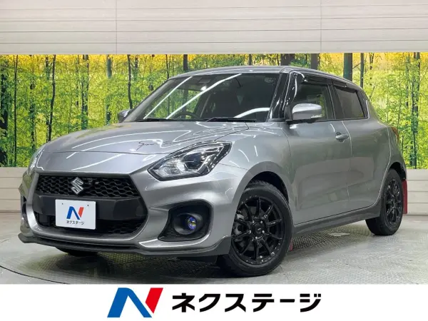 Suzuki Swift Sport 1.4 6MT 9-inch Navi Surround View Camera Collision Mitigation System Drive Recorder ETC LED Headlights Seat Heater Cruise Control Smart Key Push Start Seat Lifter Clearance Sonar (Premium Silver Metallic) — thumbnail 1
