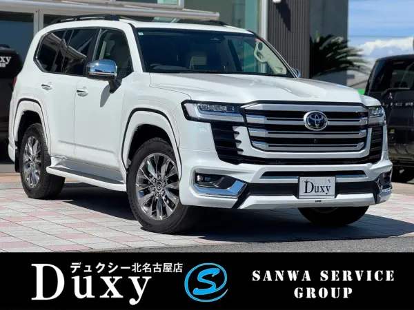 Toyota Land Cruiser 300 3.5 ZX 4WD Modellista Aero (F/R/OF) JBL Premium Sound Rear Entertainment Electric Rear Diff Lock Tire Pressure Warning System Cold Spec Cool Box Black Roof Rails Tonneau Cover Beige Leather Seat ETC (Precious White Pearl)